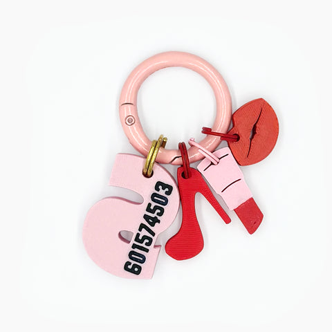 IdentiTag Chapa identificativa personalizada para perros con nombre en bajo relieve, número de teléfono visible y charms intercambiables como emojis, rayos o iconos NFC. Diseño moderno, ideal para perros con estilo WOD3D