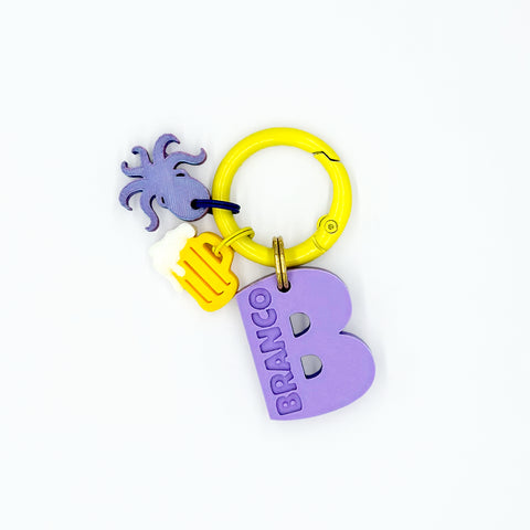 IdentiTag Chapa identificativa personalizada para perros con nombre en bajo relieve, número de teléfono visible y charms intercambiables como emojis, rayos o iconos NFC. Diseño moderno, ideal para perros con estilo WOD3D