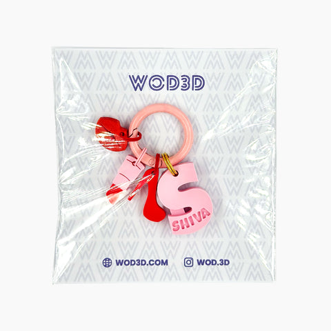 IdentiTag Chapa identificativa personalizada para perros con nombre en bajo relieve, número de teléfono visible y charms intercambiables como emojis, rayos o iconos NFC. Diseño moderno, ideal para perros con estilo WOD3D